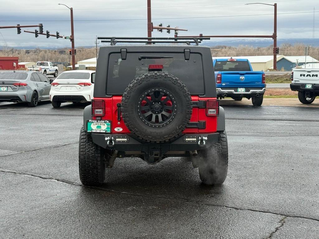 used 2014 Jeep Wrangler Unlimited car, priced at $23,095