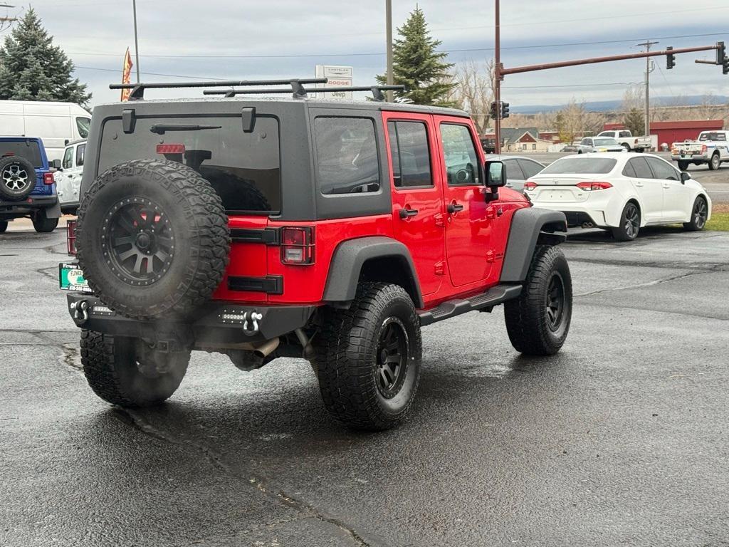 used 2014 Jeep Wrangler Unlimited car, priced at $23,095
