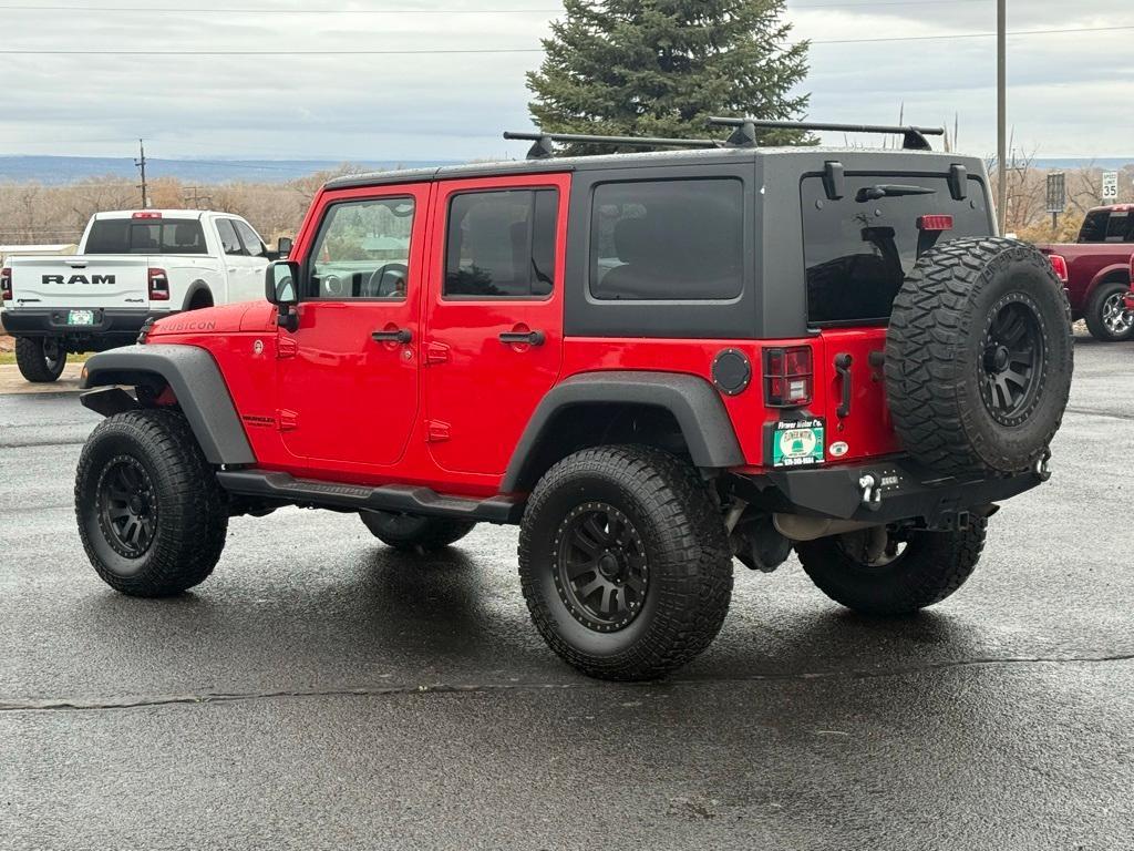 used 2014 Jeep Wrangler Unlimited car, priced at $23,095