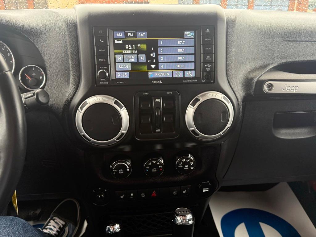 used 2014 Jeep Wrangler Unlimited car, priced at $23,095