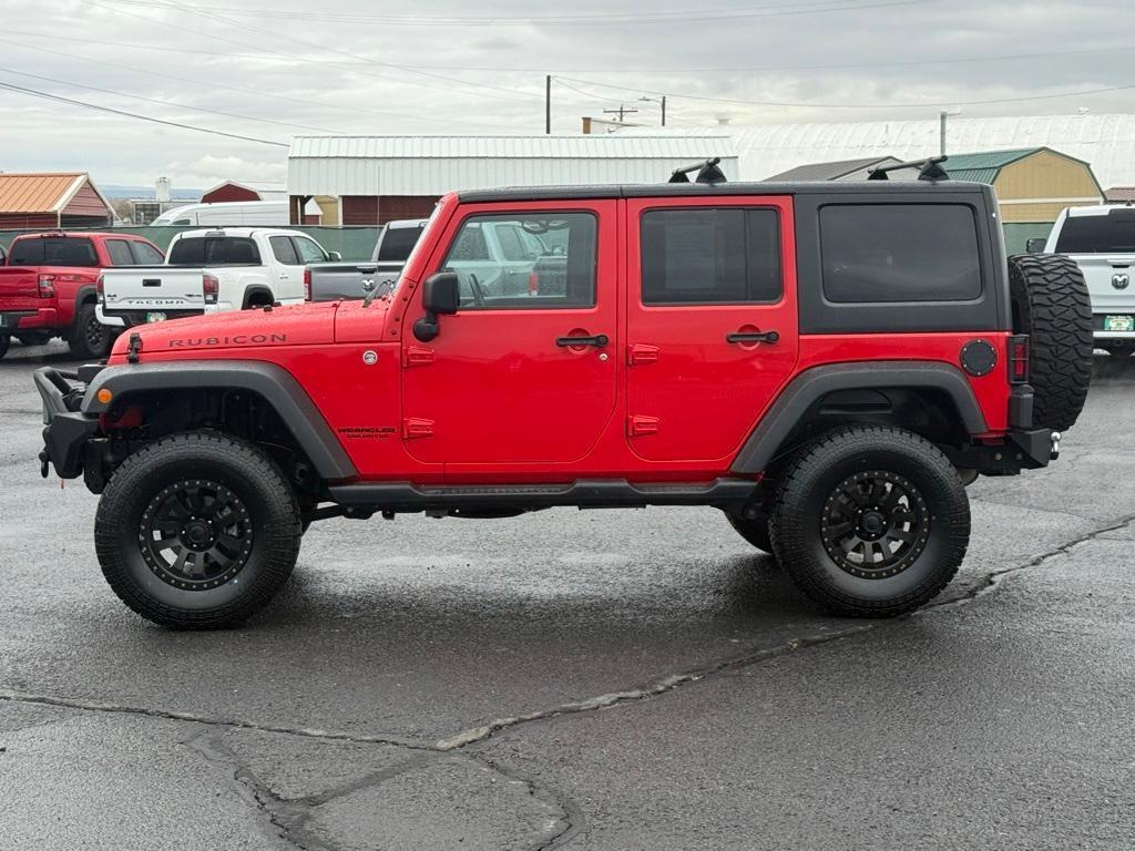 used 2014 Jeep Wrangler Unlimited car, priced at $23,095