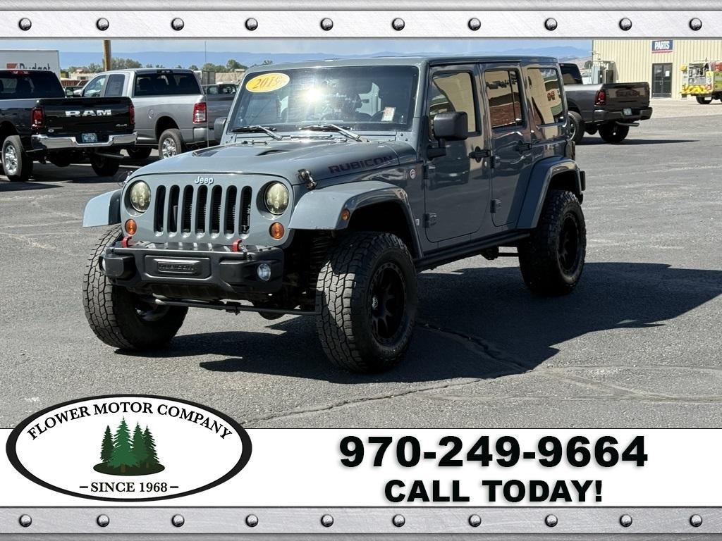 used 2013 Jeep Wrangler Unlimited car, priced at $20,485