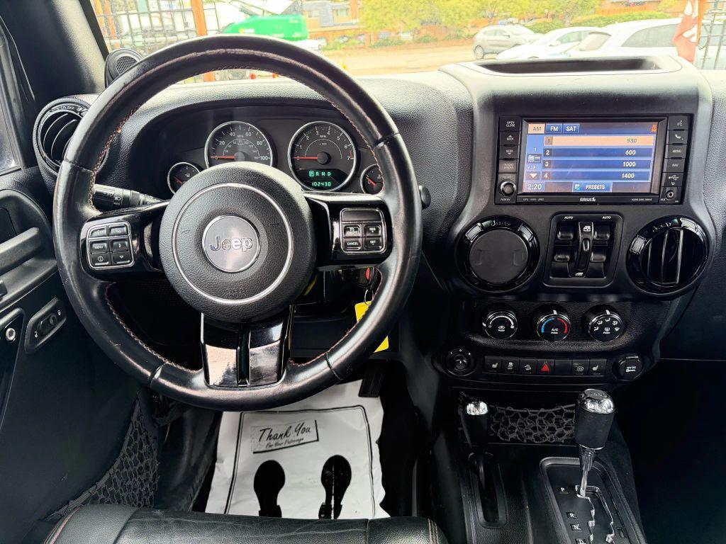 used 2012 Jeep Wrangler Unlimited car, priced at $14,999