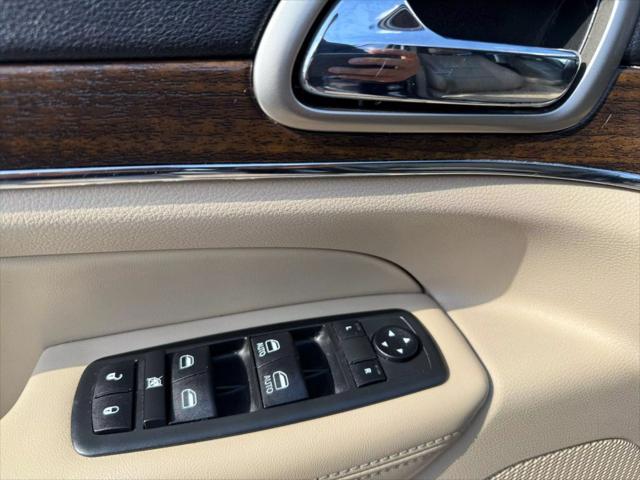 used 2014 Jeep Grand Cherokee car, priced at $11,999