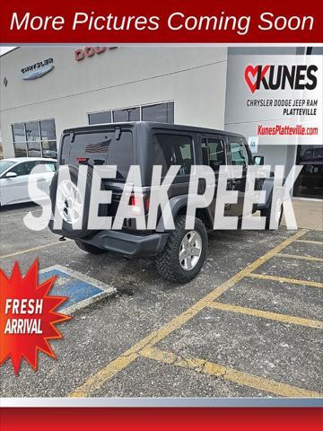 used 2018 Jeep Wrangler Unlimited car, priced at $23,977