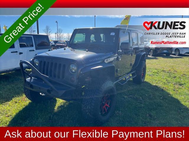 used 2012 Jeep Wrangler Unlimited car, priced at $17,477