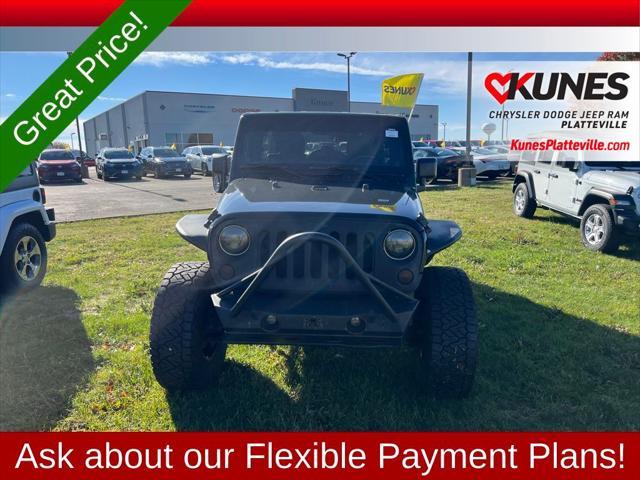 used 2012 Jeep Wrangler Unlimited car, priced at $17,477