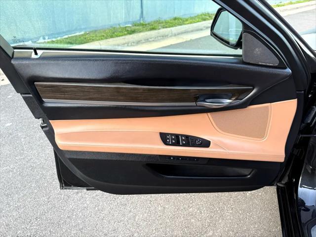 used 2014 BMW 750 car, priced at $15,499