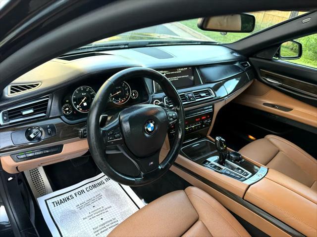 used 2014 BMW 750 car, priced at $15,499