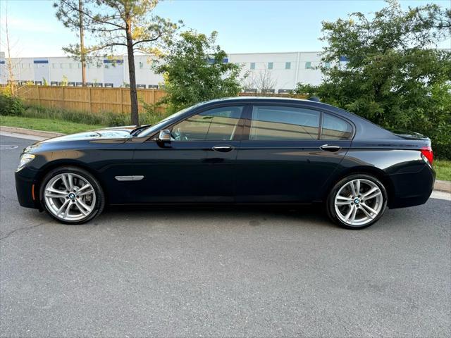 used 2014 BMW 750 car, priced at $15,499