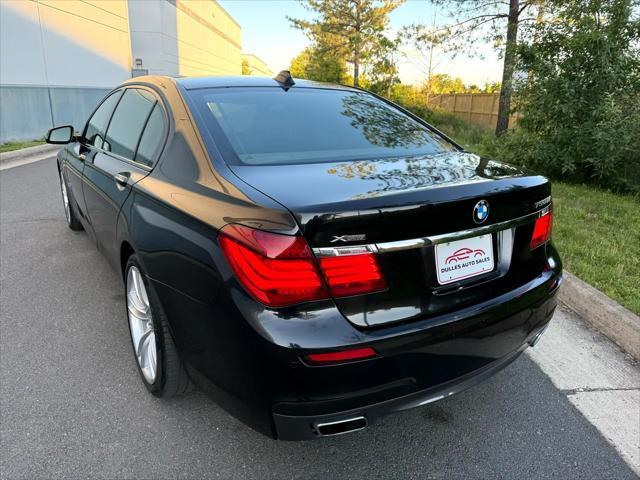 used 2014 BMW 750 car, priced at $15,499
