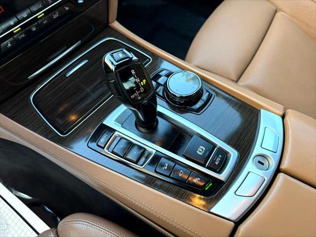 used 2014 BMW 750 car, priced at $15,499