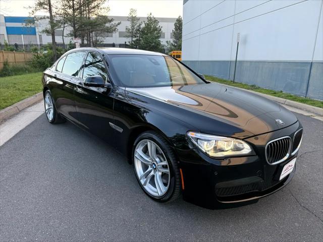 used 2014 BMW 750 car, priced at $15,499