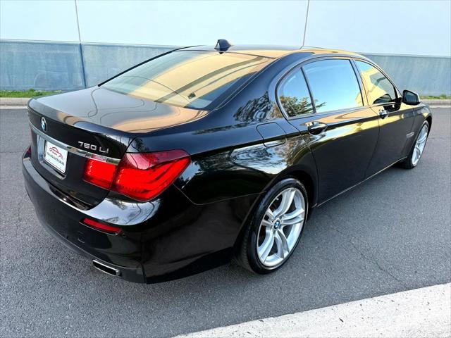 used 2014 BMW 750 car, priced at $15,499