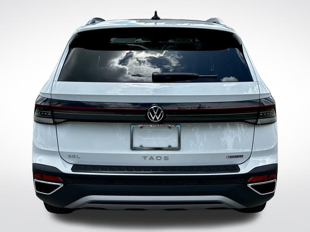 new 2025 Volkswagen Taos car, priced at $30,574