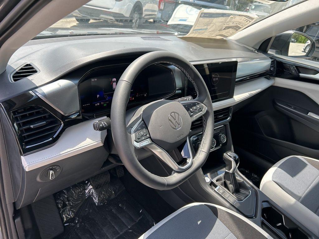 new 2025 Volkswagen Taos car, priced at $23,354