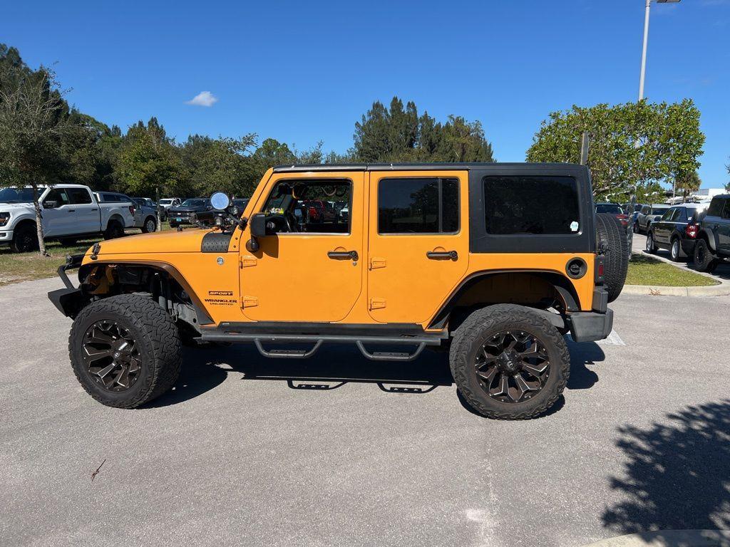 used 2012 Jeep Wrangler Unlimited car, priced at $11,999