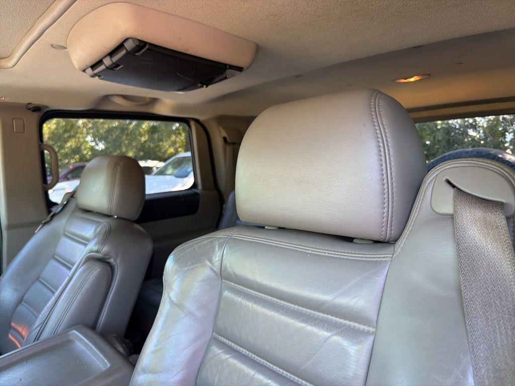 used 2003 Hummer H2 car, priced at $9,999