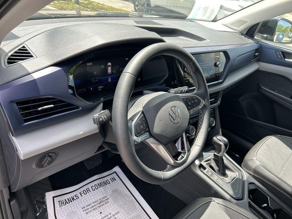 used 2023 Volkswagen Taos car, priced at $21,977