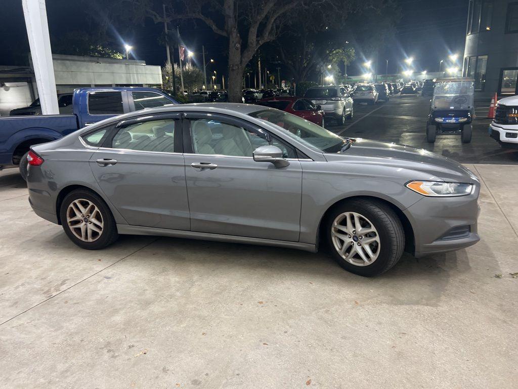 used 2014 Ford Fusion car, priced at $3,999