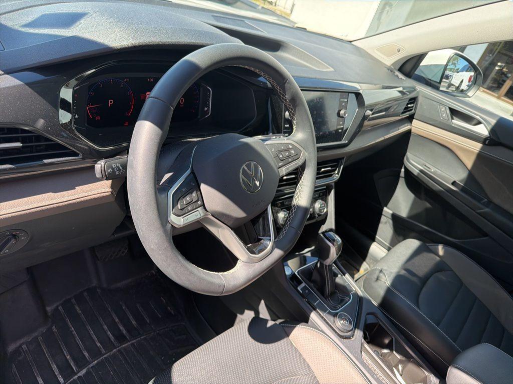 used 2023 Volkswagen Taos car, priced at $22,497