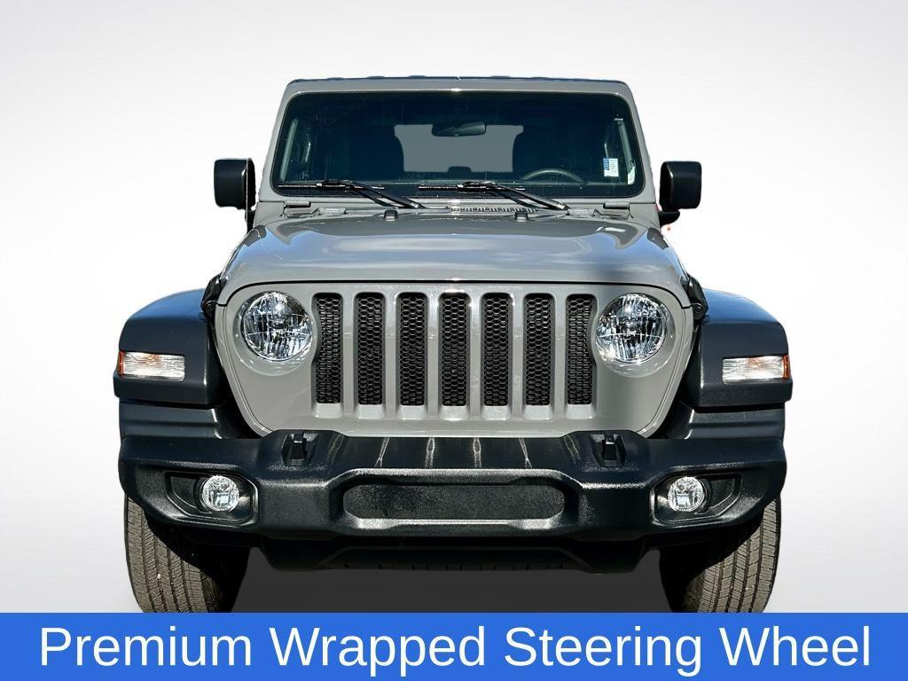 used 2023 Jeep Wrangler car, priced at $27,637