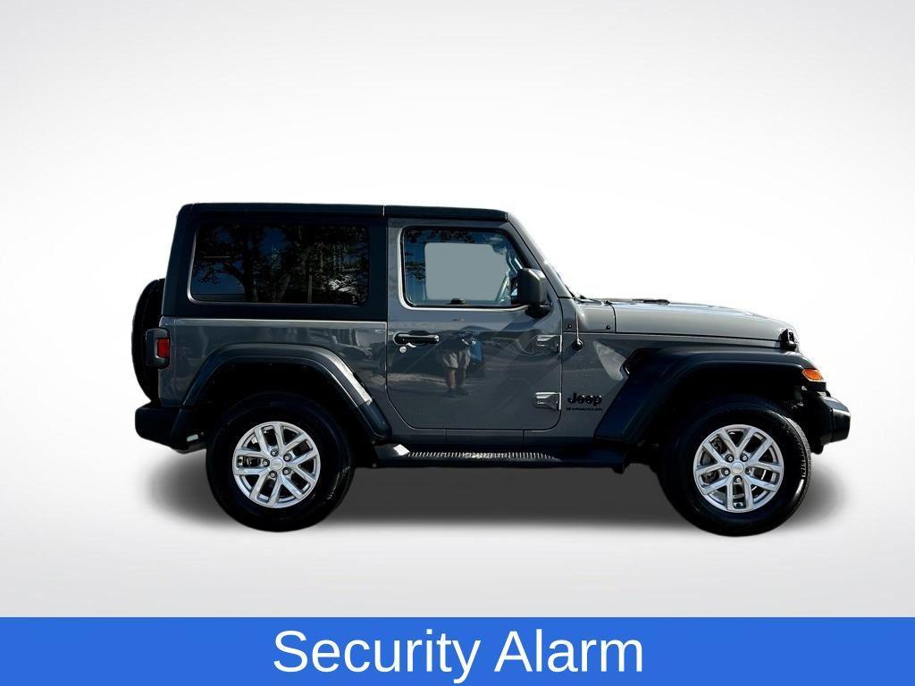 used 2023 Jeep Wrangler car, priced at $27,637