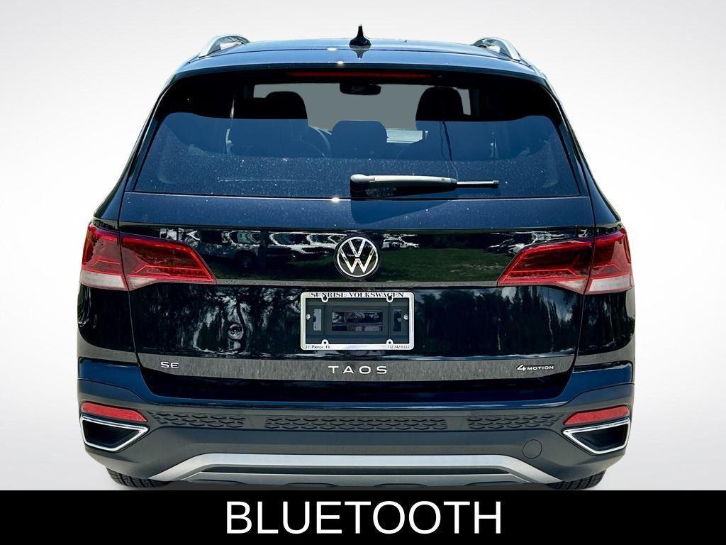 used 2024 Volkswagen Taos car, priced at $24,909