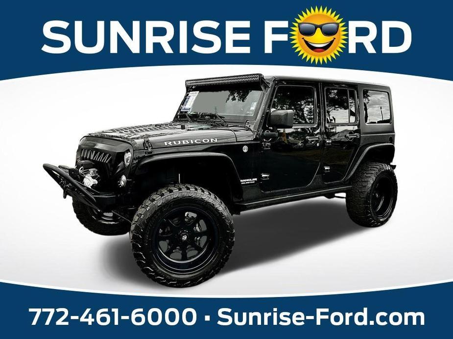 used 2017 Jeep Wrangler Unlimited car, priced at $27,991