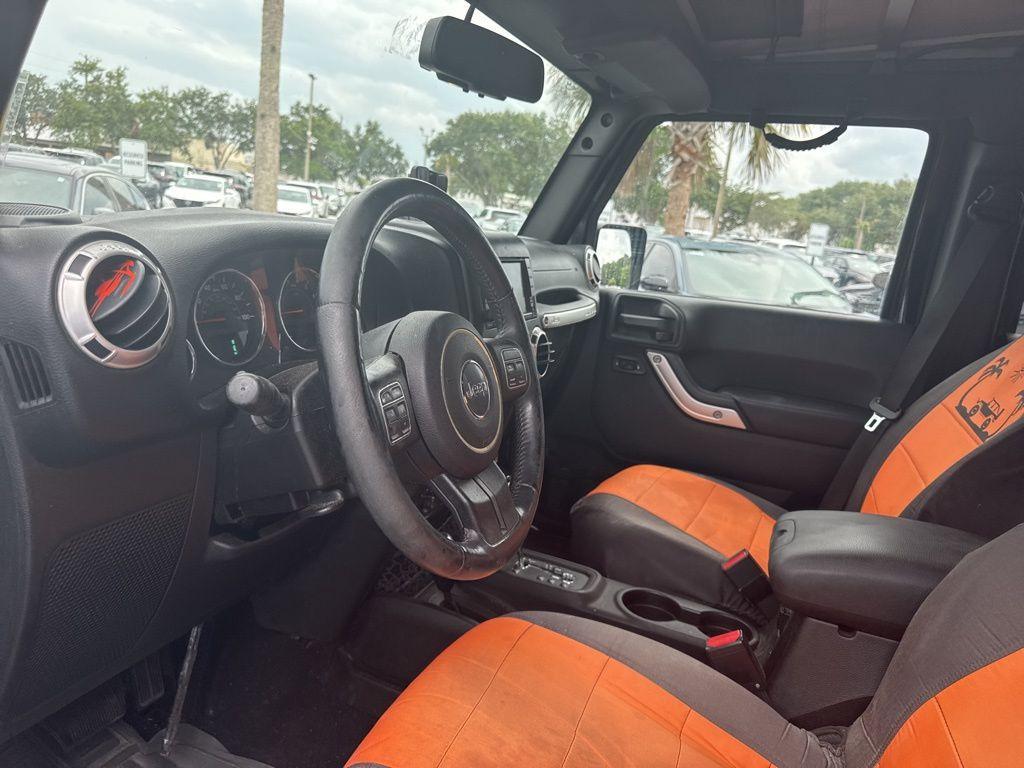 used 2015 Jeep Wrangler Unlimited car, priced at $17,256