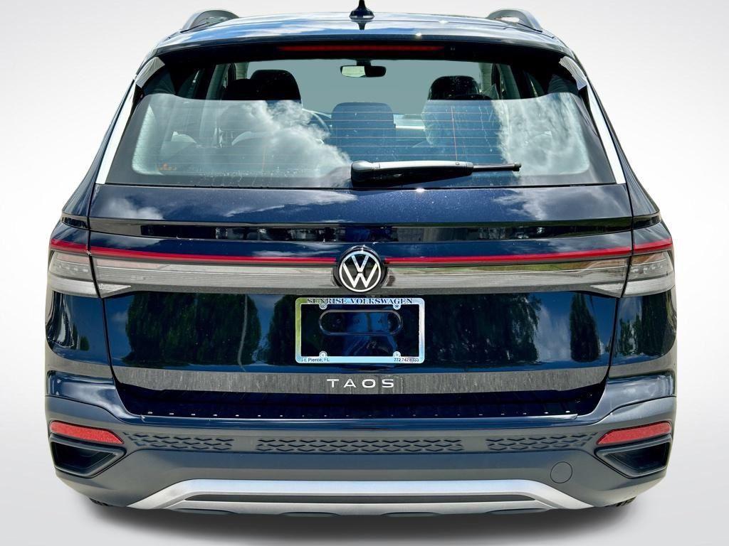 new 2025 Volkswagen Taos car, priced at $25,159