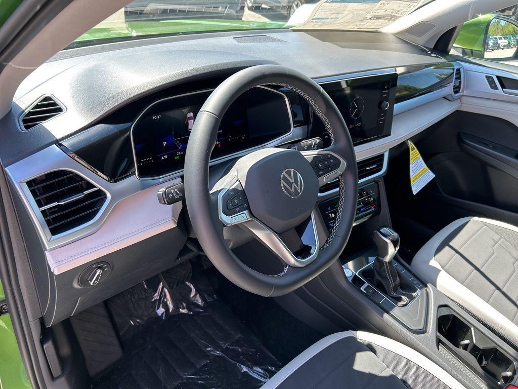 used 2025 Volkswagen Taos car, priced at $27,625