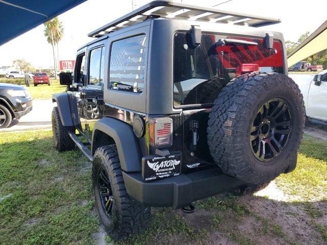 used 2013 Jeep Wrangler Unlimited car, priced at $15,995