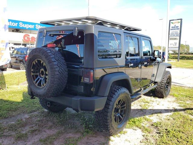 used 2013 Jeep Wrangler Unlimited car, priced at $15,995