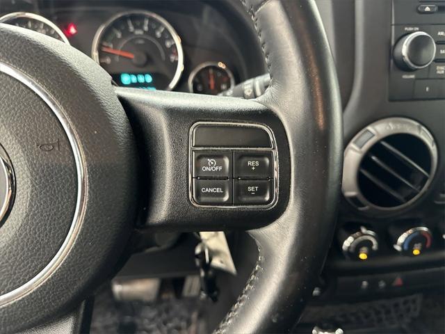 used 2016 Jeep Wrangler Unlimited car, priced at $16,069