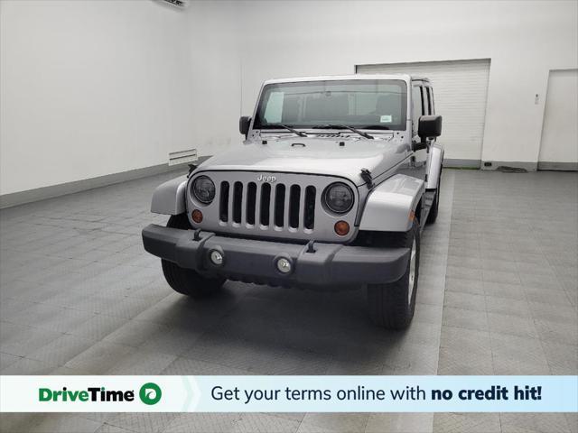 used 2013 Jeep Wrangler Unlimited car, priced at $19,095