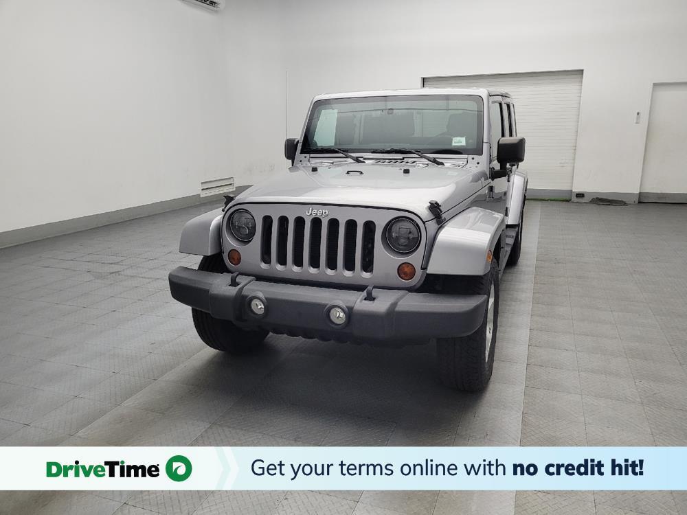 used 2013 Jeep Wrangler Unlimited car, priced at $19,095