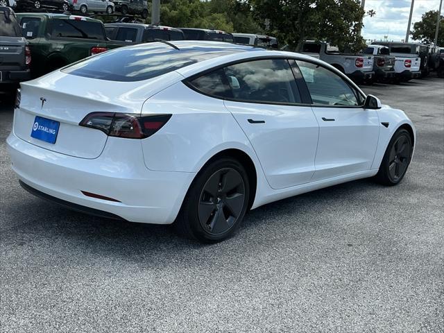 used 2023 Tesla Model 3 car, priced at $26,495