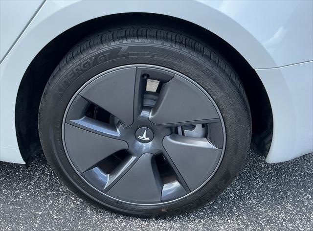 used 2023 Tesla Model 3 car, priced at $26,495