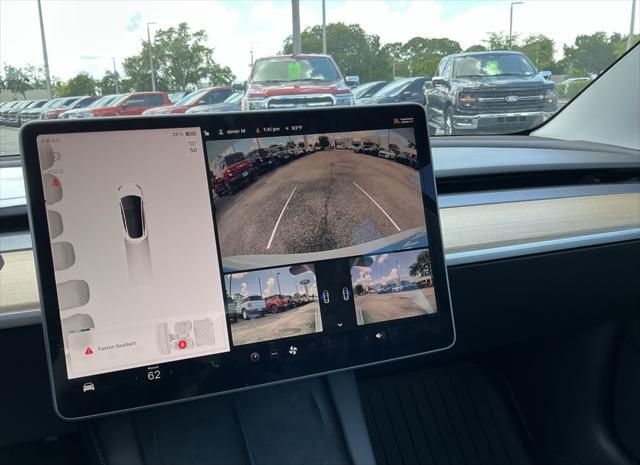 used 2023 Tesla Model 3 car, priced at $26,495