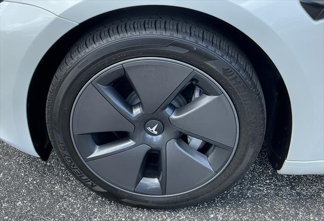 used 2023 Tesla Model 3 car, priced at $26,495