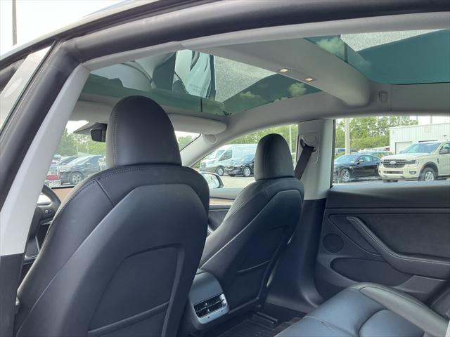 used 2023 Tesla Model 3 car, priced at $26,495