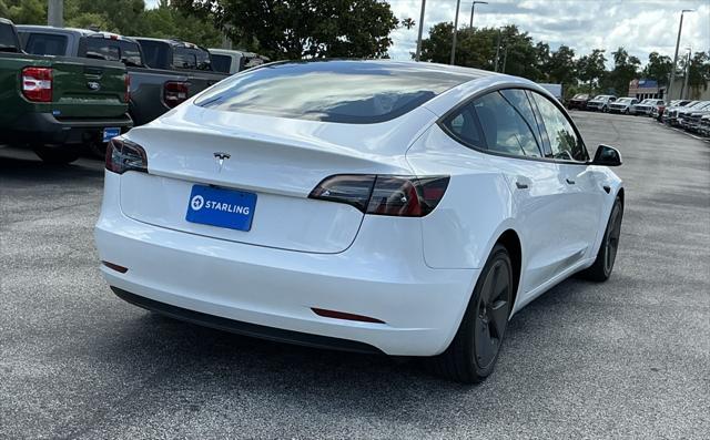 used 2023 Tesla Model 3 car, priced at $26,495