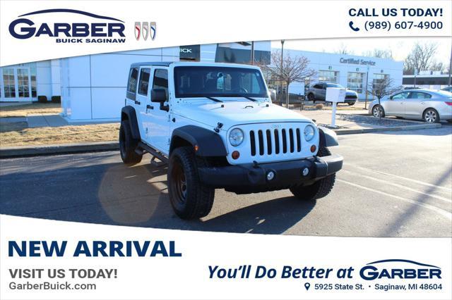 used 2013 Jeep Wrangler Unlimited car, priced at $14,696