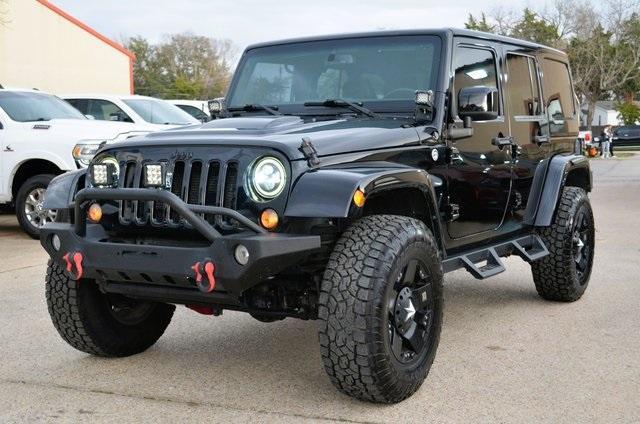 used 2015 Jeep Wrangler Unlimited car, priced at $23,490