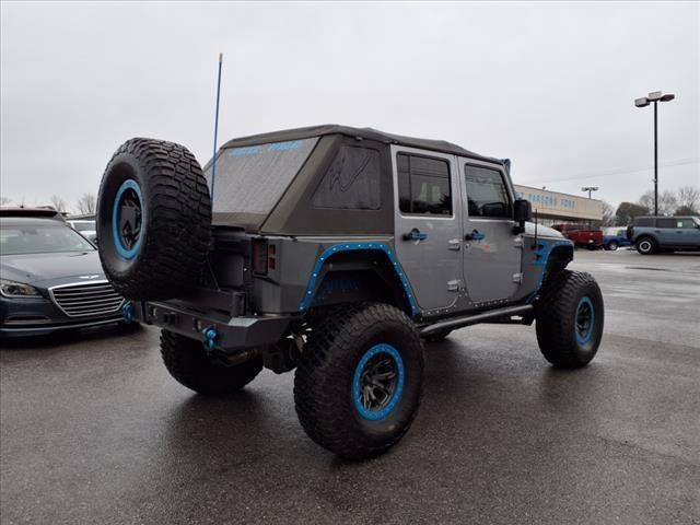 used 2013 Jeep Wrangler Unlimited car, priced at $32,900