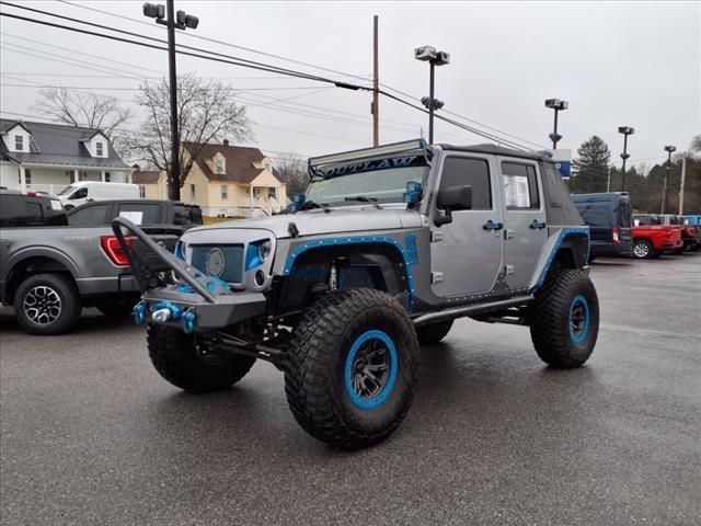 used 2013 Jeep Wrangler Unlimited car, priced at $32,900