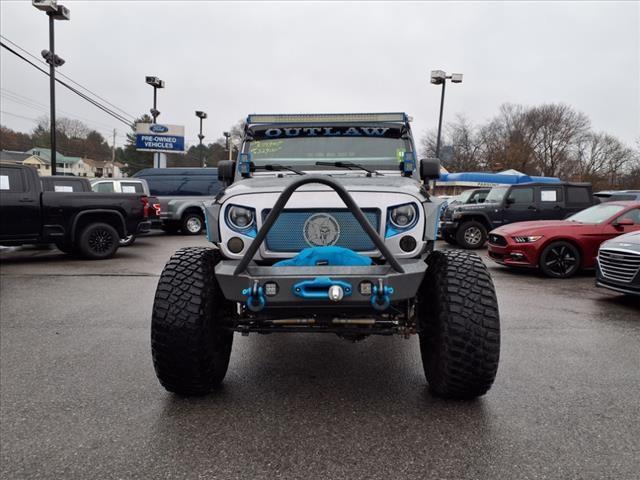 used 2013 Jeep Wrangler Unlimited car, priced at $32,900