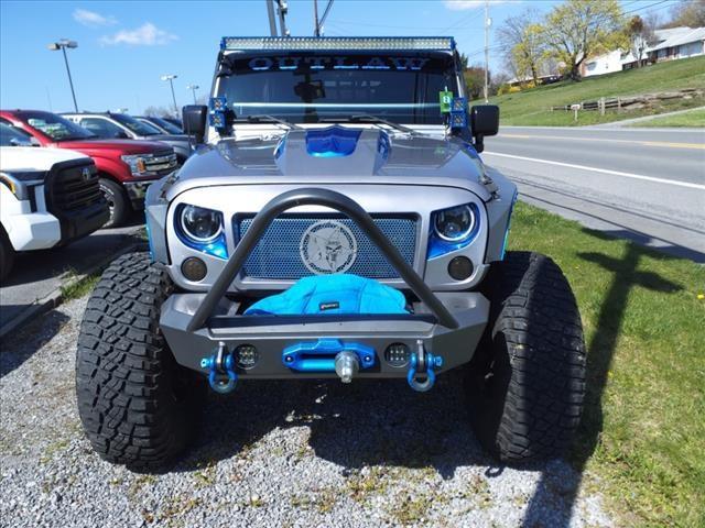 used 2013 Jeep Wrangler Unlimited car, priced at $32,900