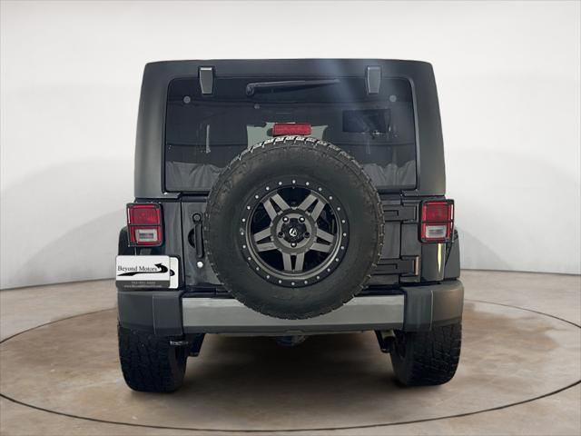 used 2014 Jeep Wrangler Unlimited car, priced at $18,500